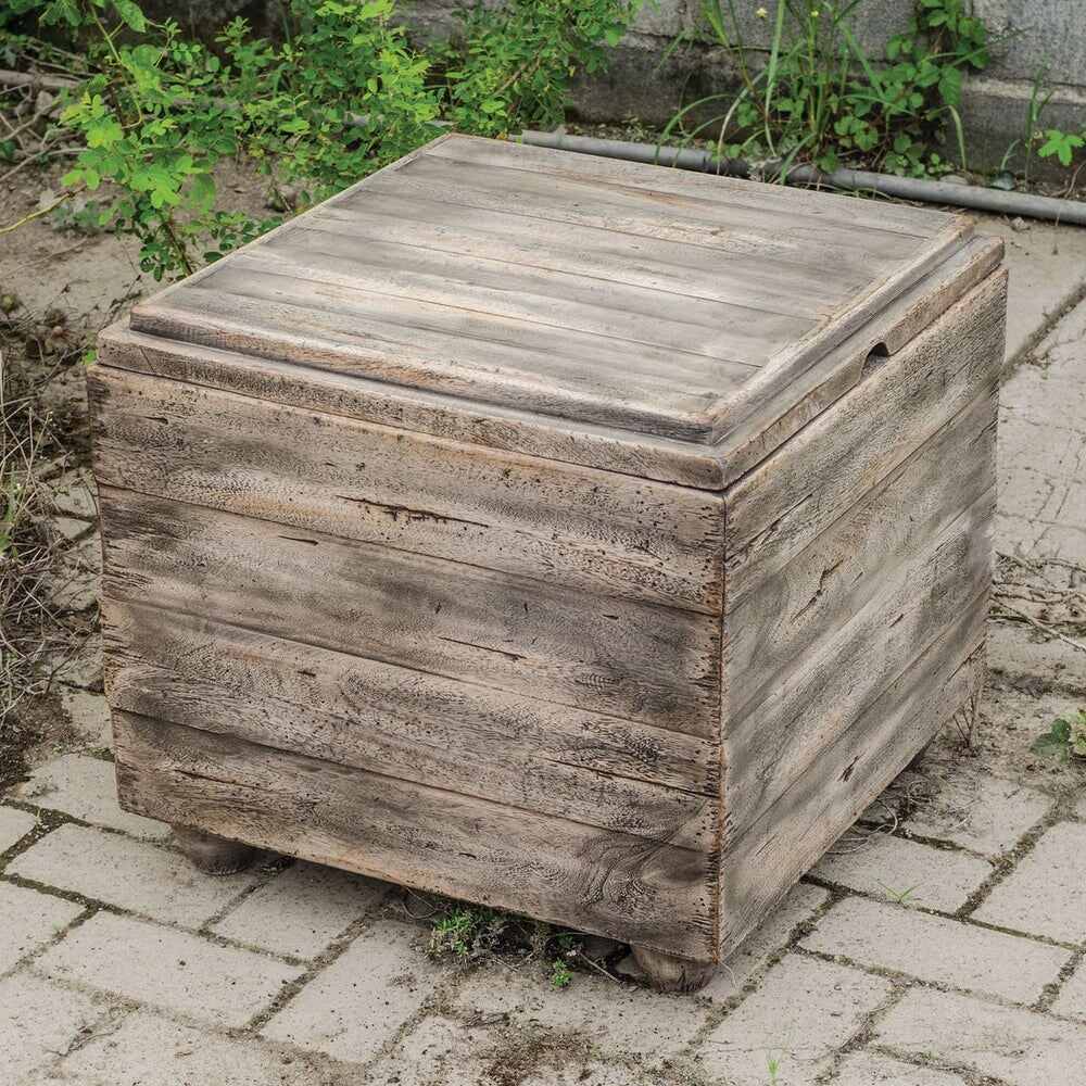 Sustainable mango wood bunching table with a waxed driftwood finish and lift-off top for serving.