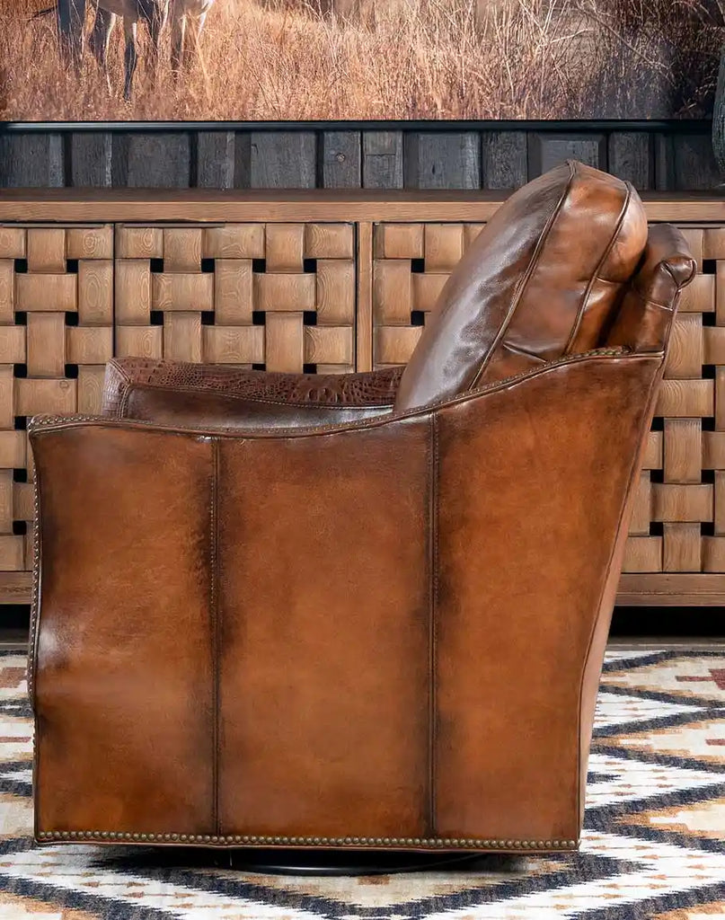 Side profile of the Allie Calexico Swivel Glider highlighting its sleek lines and luxurious craftsmanship.