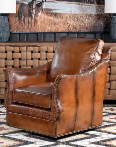 Front view of the Allie Calexico Swivel Glider, showcasing hand-burnished leather and embossed crocodile grain detailing.