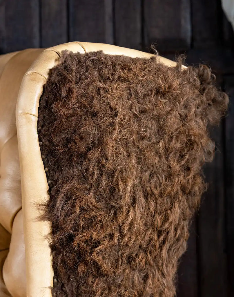 A detailed view of the bison hair panel on the chair’s side, adding a distinctive rustic charm.