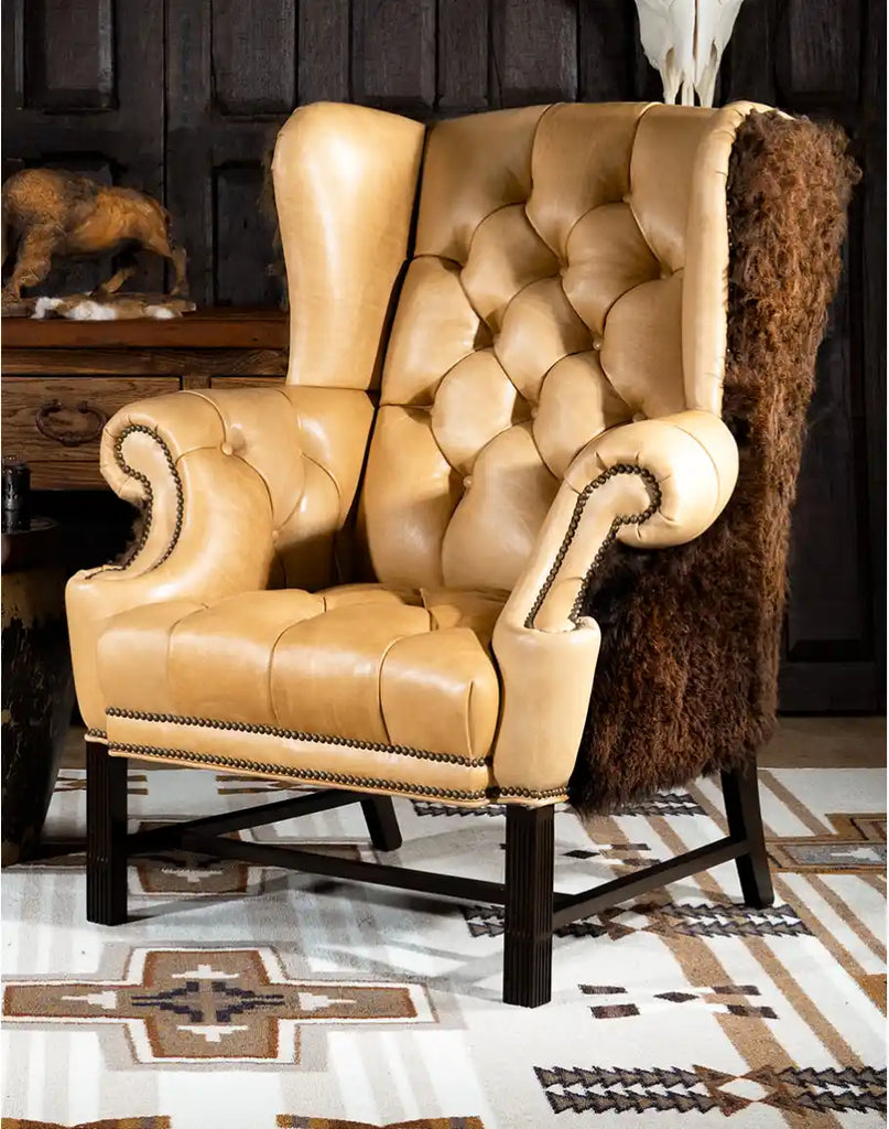 American Buffalo Chair showcasing its deep button tufting and rich full-grain leather upholstery.