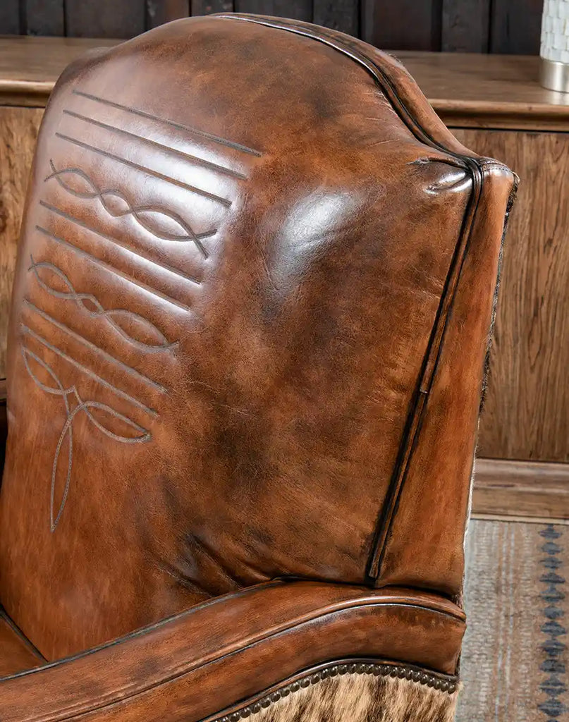 Close-up of the premium full-grain leather upholstery with hand-burnished finish.