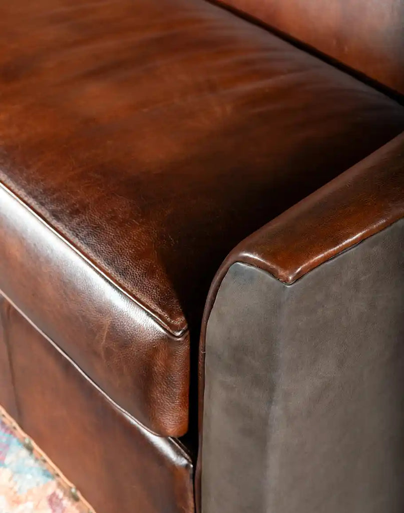 Detailed view of the seat and back cushions, illustrating the plushness and comfort of the sofa.