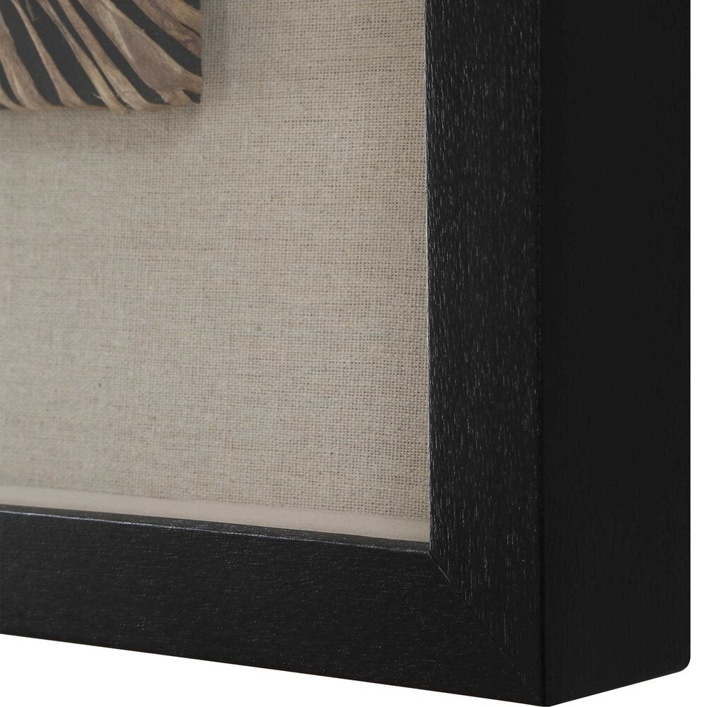 Artisan-crafted shadow boxes featuring neutral-toned woven knit paper designs, styled in a contemporary home setting.