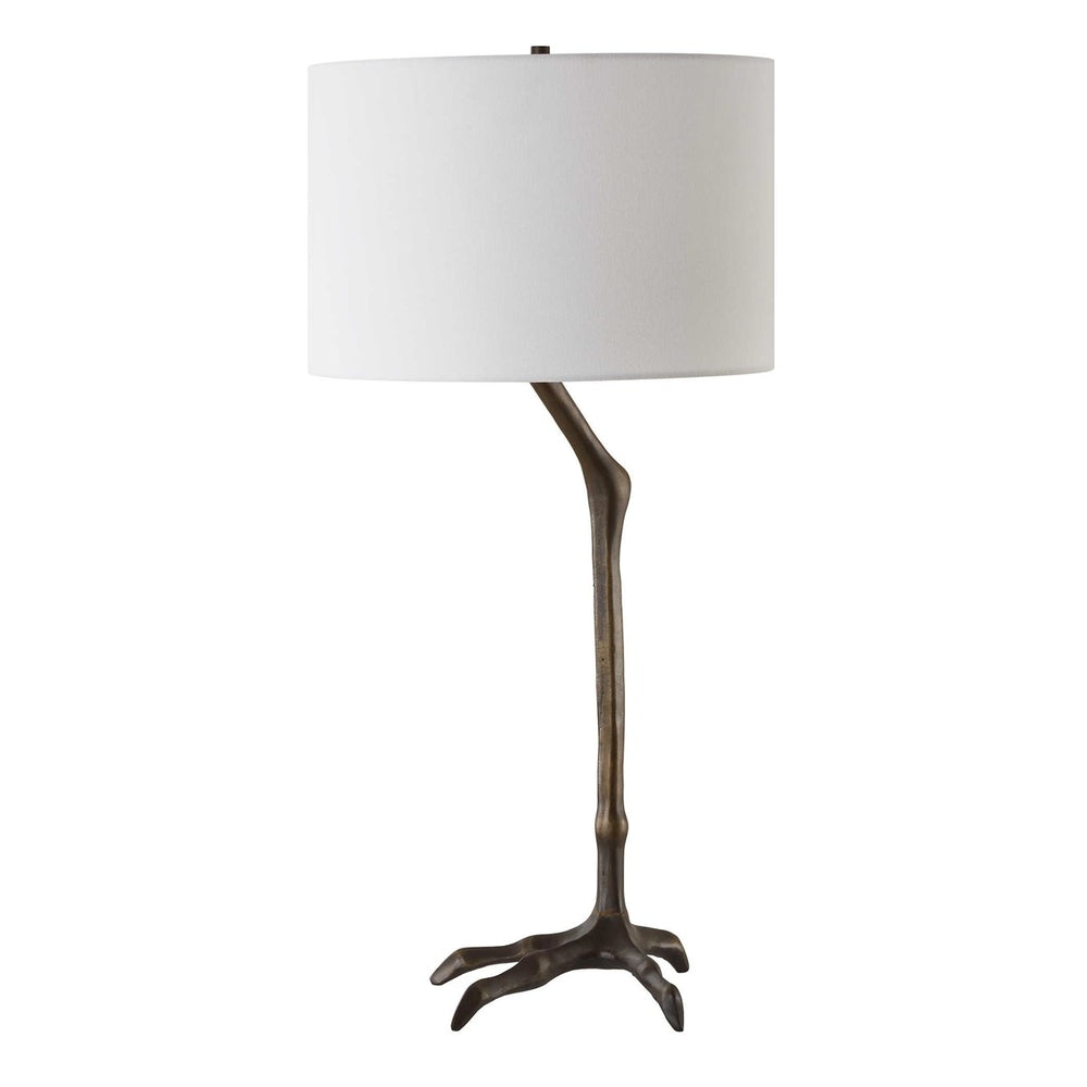 Artistic table lamp with a slim bird-leg base, antique bronze finish, and a white linen fabric shade for a polished look.