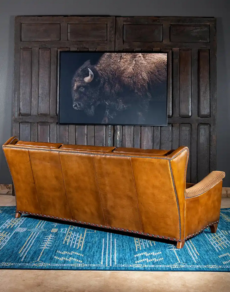 Rear-facing image of the Norse Leather Sofa, displaying the flawless finish of its full-grain leather backrest.