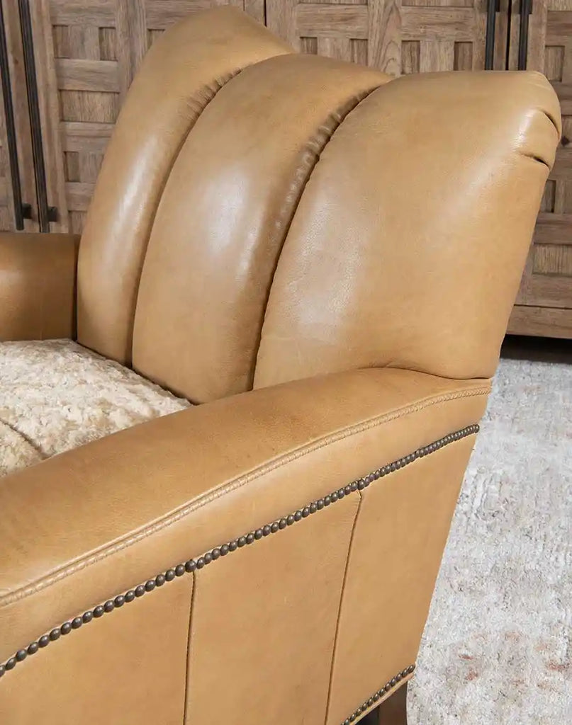 Close-up image of the channeled backrest on the Beige Sand Club Chair, emphasizing its supportive and ergonomic design.