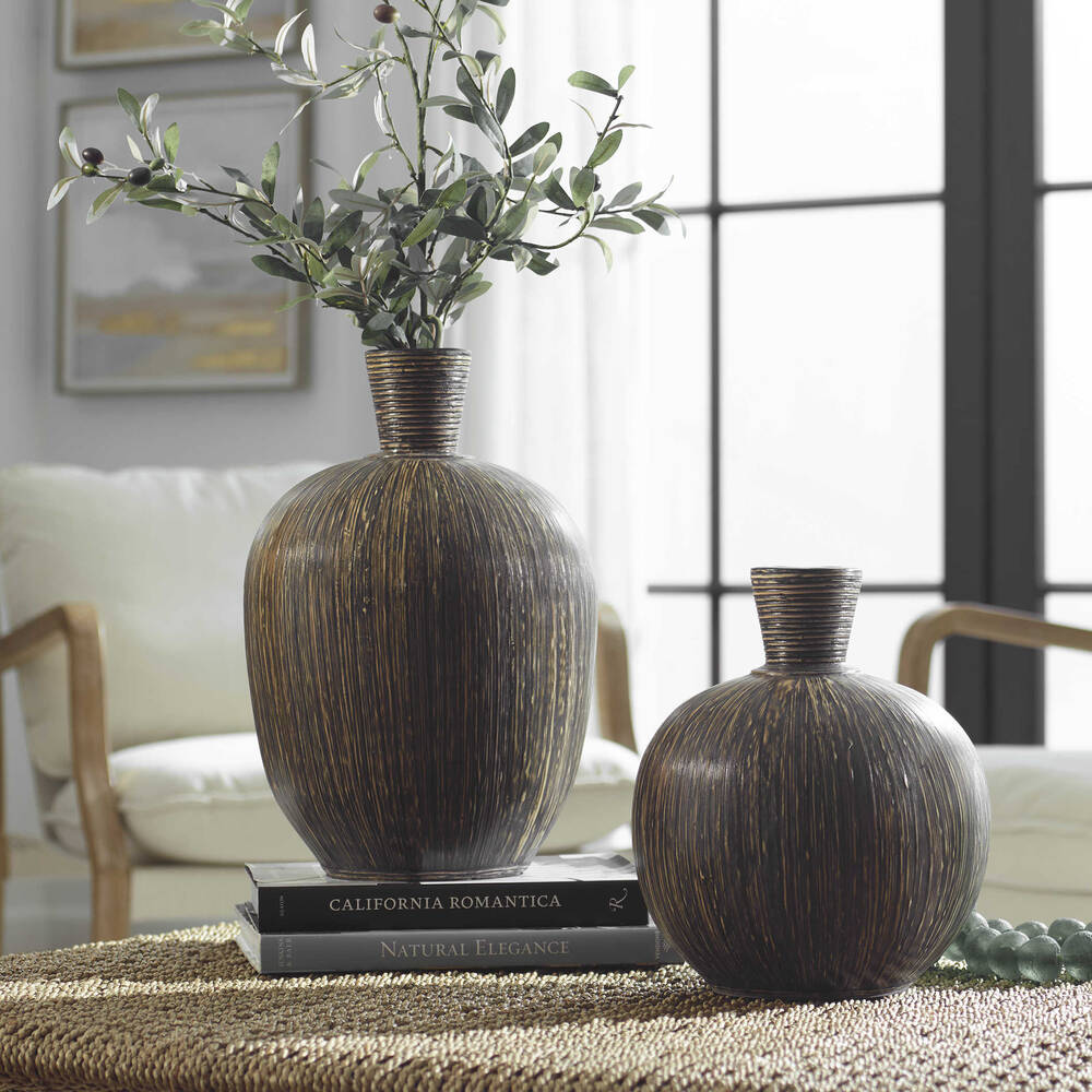 Stylish Isla Terra Cotta vases with black washed finish and bamboo stripe details, perfect for modern decor.