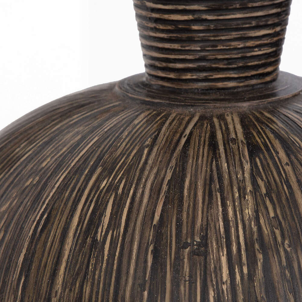 Close-up of Isla Terra Cotta vases with bamboo stripe motif and elegant black wash accents.