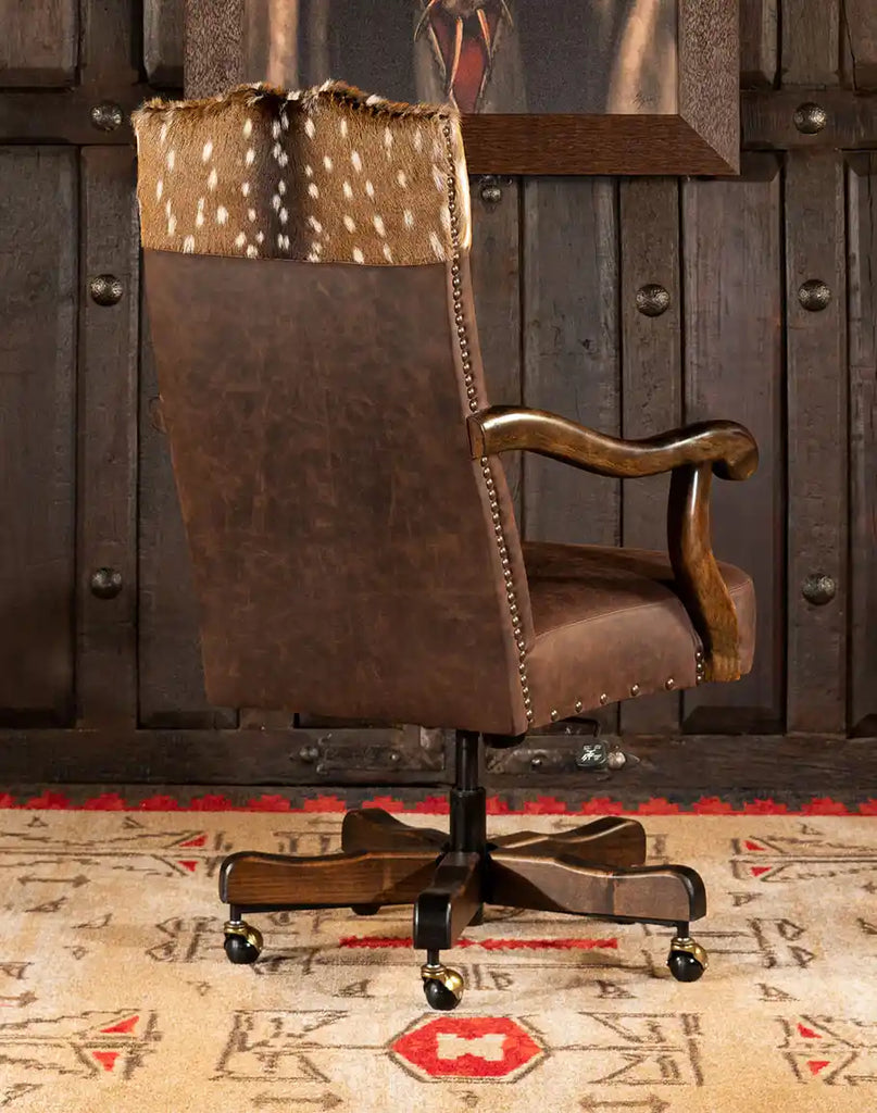 A back view of the Bowie Axis Taupe Desk Chair, featuring the distinctive Axis Deer Hide yoke and luxurious leather frame.