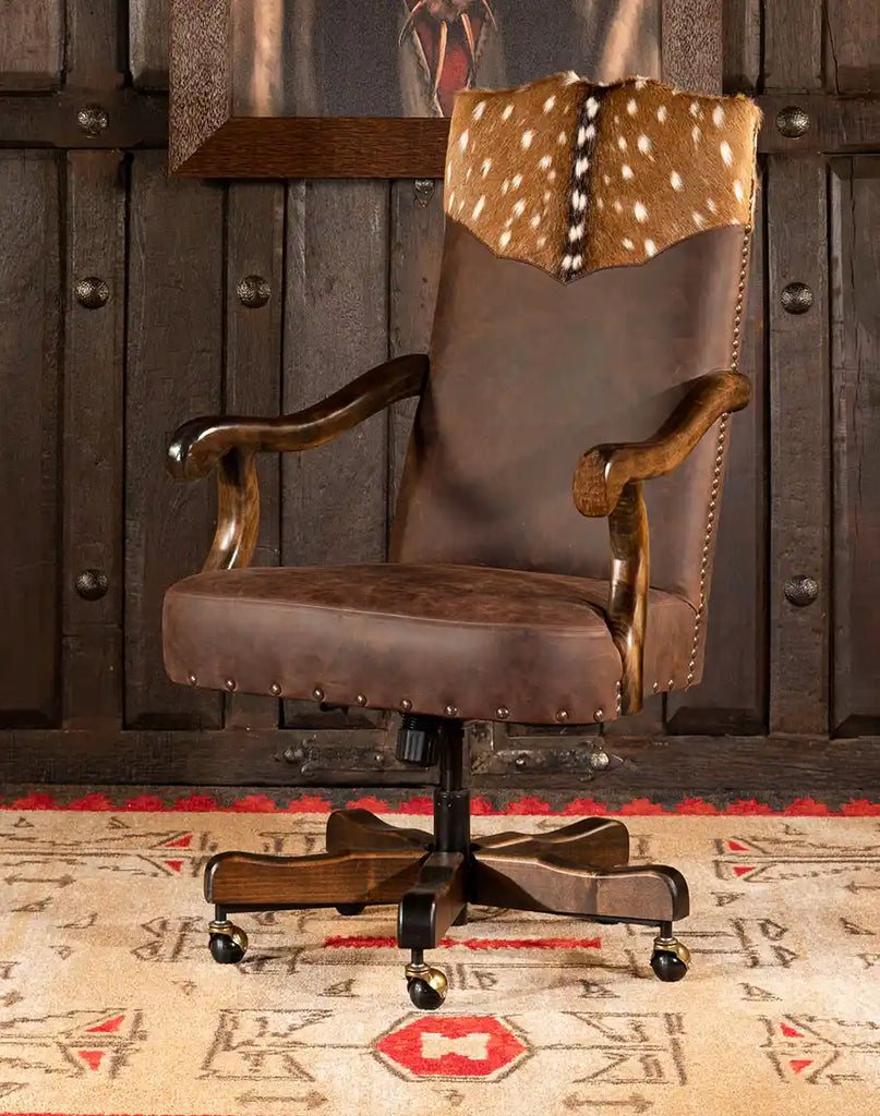 Bowie Axis Taupe Desk Chair, showcasing its distressed taupe leather upholstery and Axis Deer Hide yoke.