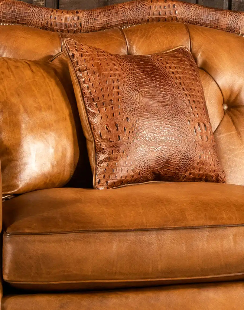 Detailed view of the embossed croc leather accents on the Brandon Tufted Leather Sofa for a touch of sophistication.