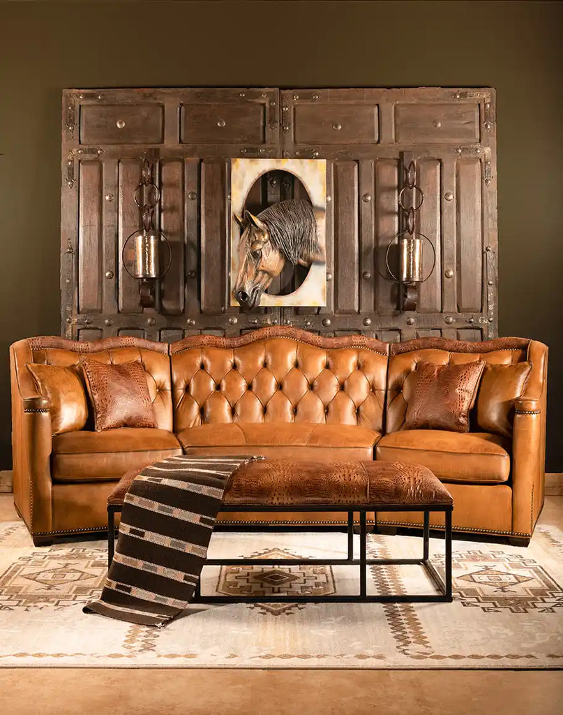 Set of four included leather pillows for added comfort and style on the Brandon Tufted Leather Sofa.