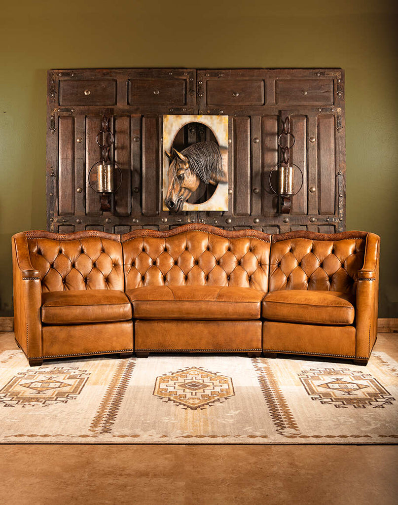 Brandon Tufted Leather Sofa showcasing its top-grain leather construction and elegant tufted design.