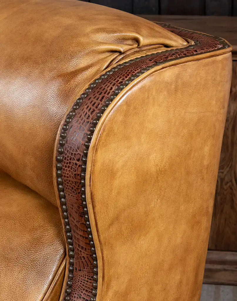 Detailed view of the embossed croc leather accent on the Bravo Westworth Recliner, adding a unique Western touch to its design.