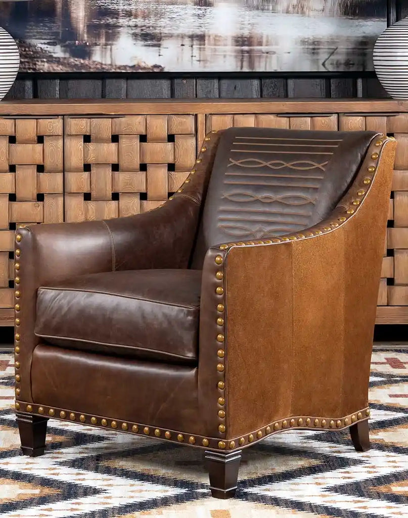 Cassie Brown Leather Chair styled in a rustic living room with complementary wood accents and Western decor.