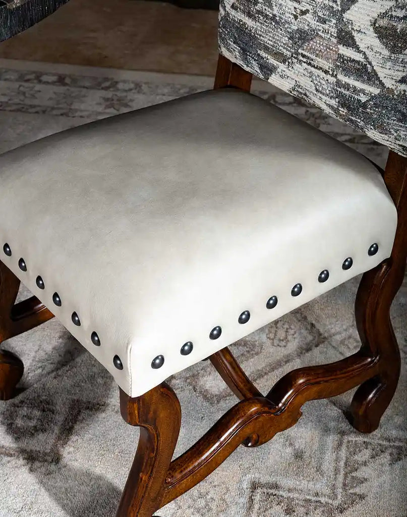 Detailed shot focusing on the luxurious cream top-grain leather seat cushion.