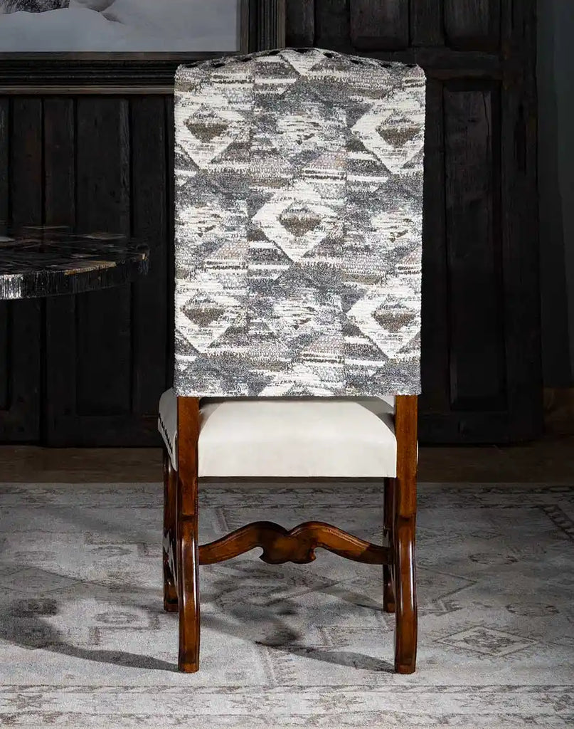 Back perspective highlighting the unpredictable yet captivating fabric pattern on the backrest.