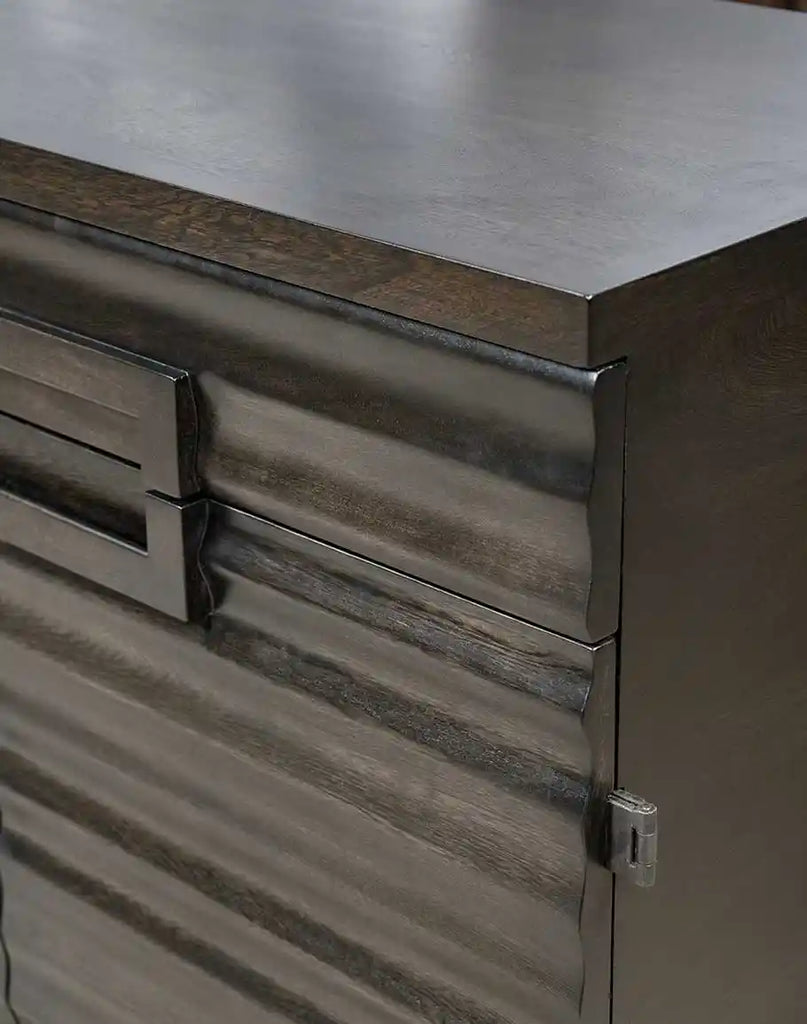 Detailed close-up of the cascading ridged texture on the cabinet fronts of the Charcoal Cascade Buffet, highlighting its unique design.