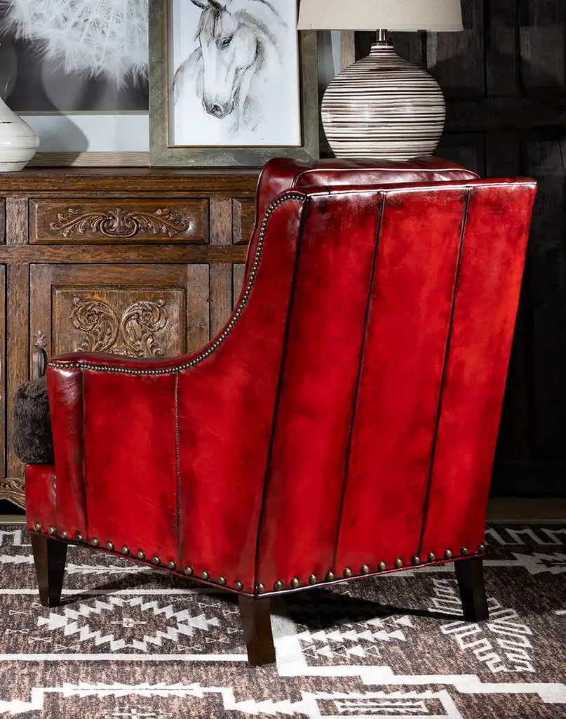 Rear view of the Cherry Red Leather Chair, featuring high-quality hand-burnished red leather with a distressed, rustic finish.