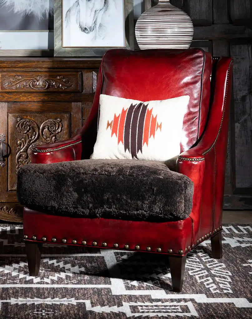 Cherry Red Leather Chair showcasing its hand-burnished red leather upholstery and chocolate shearling seat cushion.