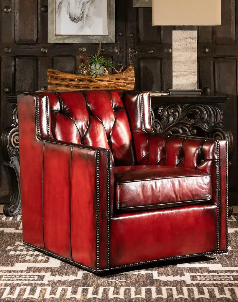 Cherry Red Swivel Chair, showcasing its deep tufted back and rich hand-burnished red leather upholstery.