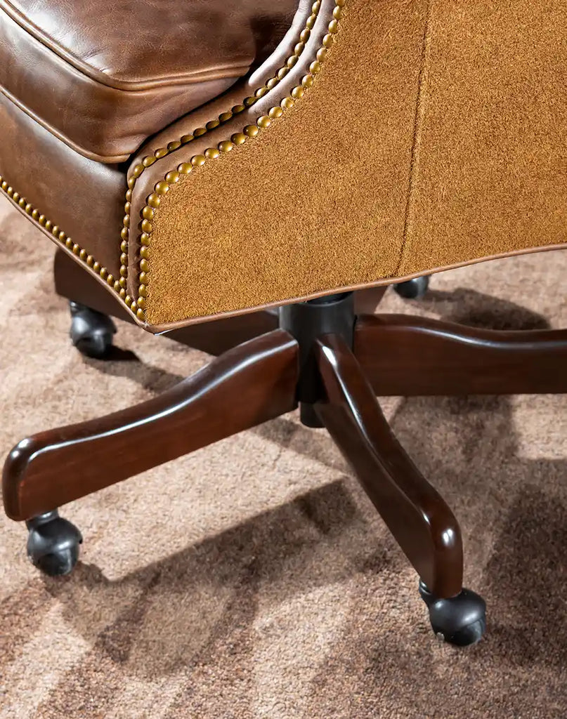 View of the adjustable height mechanism of the Chestnut Brown True Grit Executive Desk Chair ensuring customizable seating comfort.