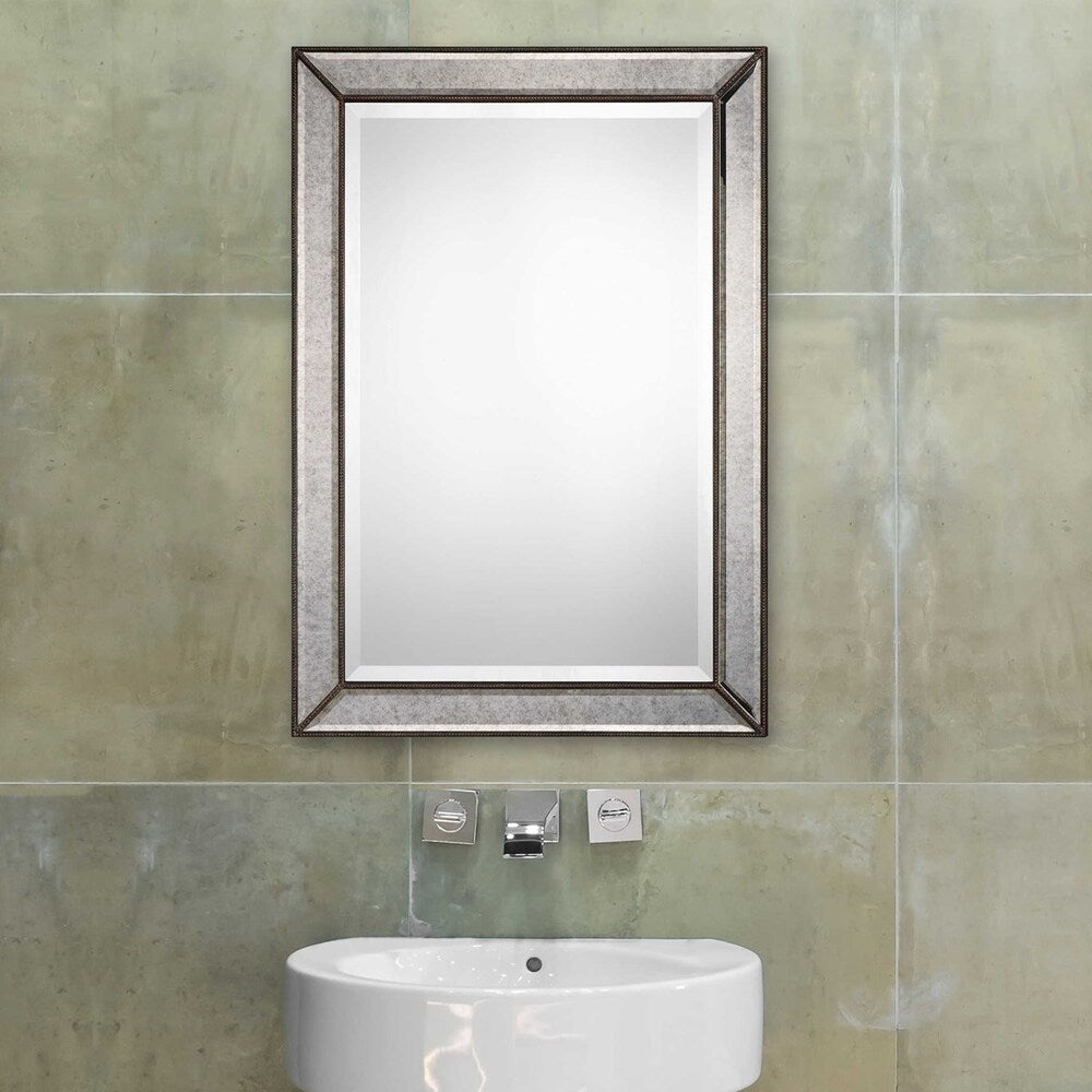 Rectangular Erised Mirror with antique-finished panels, bronze beaded detailing, and a beveled glass center.