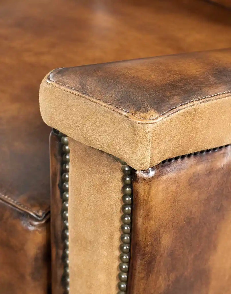 Close-up of the full-grain leather arm panel on the Vlad Recliner.