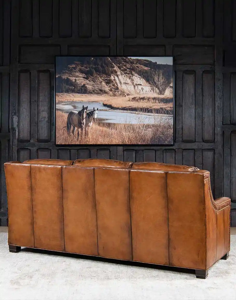 Back-facing view of the Colorado Leather Sofa, highlighting the seamless craftsmanship and elegant leather finish.