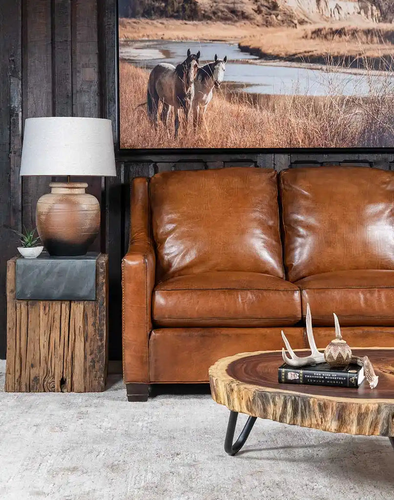 The Colorado Leather Sofa placed in a rustic-themed interior, complementing the decor with its natural ranch-style appeal.