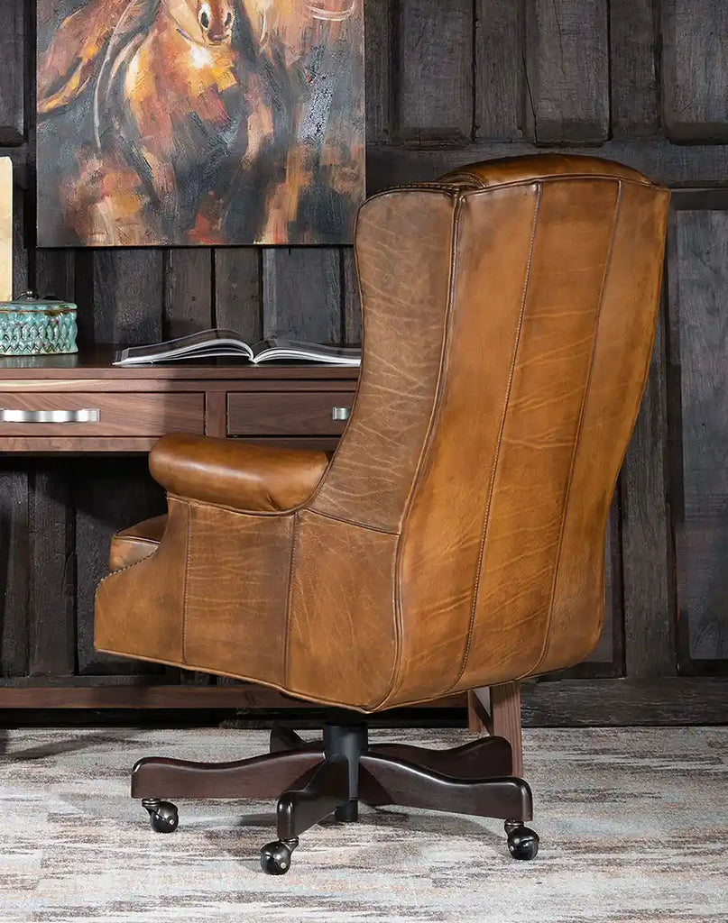 Rear view of the Cowboy Saddle Executive Desk Chair, featuring the rich finish of its solid mahogany wood frame and expertly tailored leather backrest.