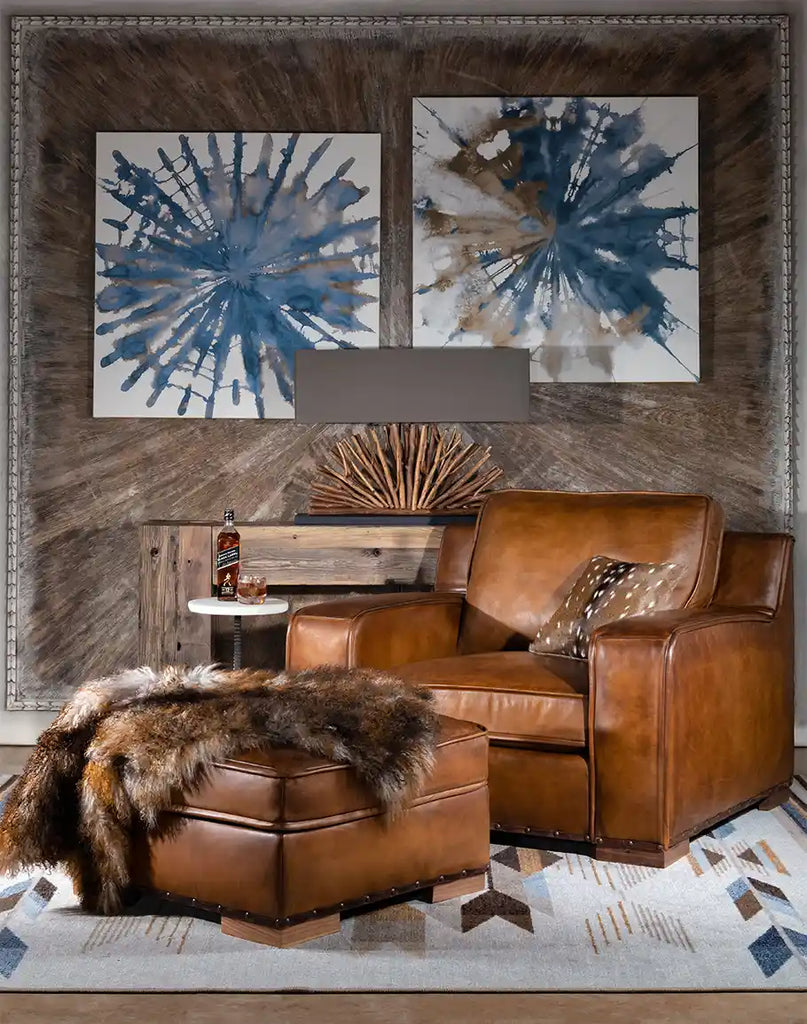 The Rusty Leather Chair paired with a matching ottoman, styled in a cozy living room featuring a fur throw, patterned rug, and artistic wall decor, emphasizing the chair's rustic charm and luxurious design.