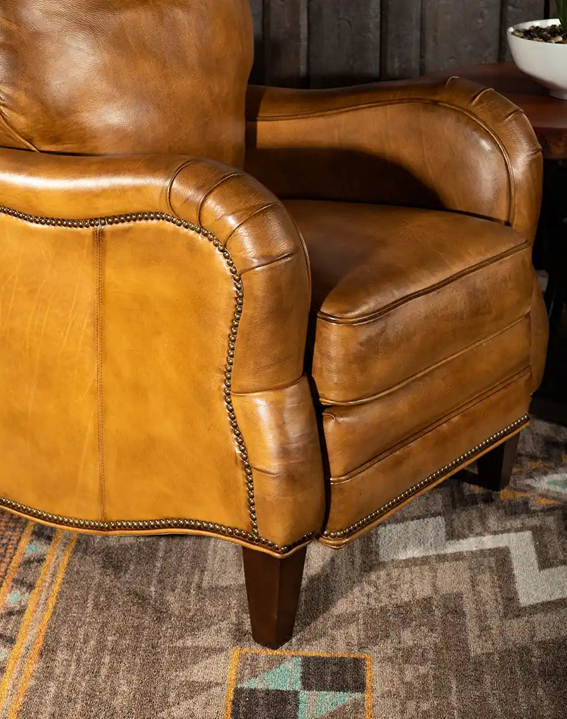 Detailed view of the wooden legs on the Cullen Saddle Leather Recliner, showcasing their sturdy craftsmanship and natural finish.