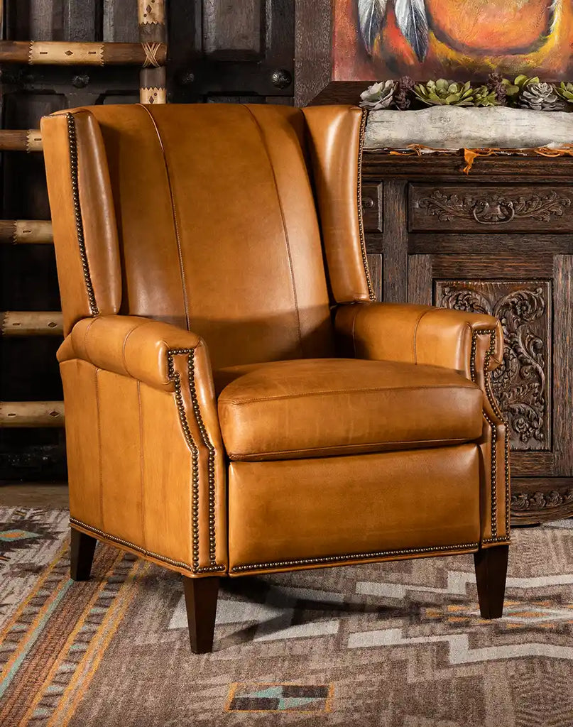 Front-facing image showcasing the full design of the Dakota Saddle Recliner, highlighting its hand-burnished tan leather and tight-back design.