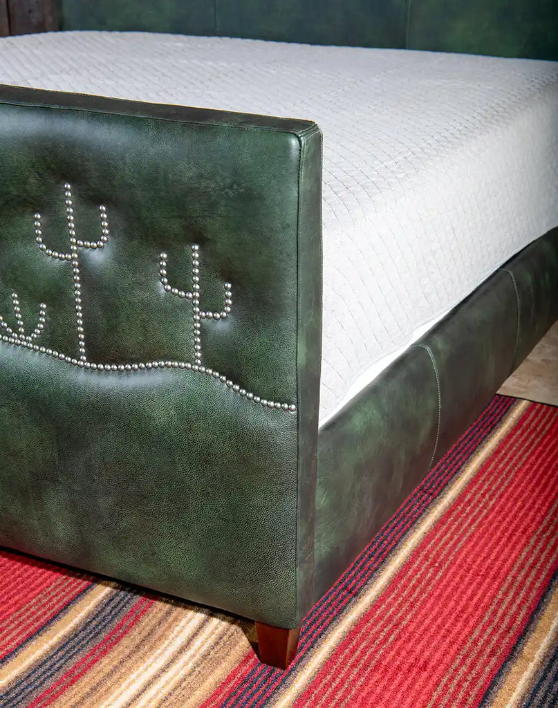 A close-up of the hand-burnished corner details on the Dark Green Cacti Bed, showcasing expert craftsmanship.