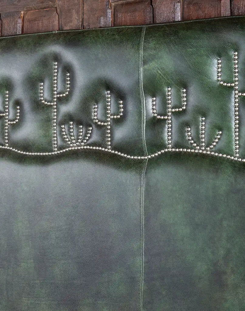 A detailed view of the Dark Green Cacti Bed’s headboard, featuring cactus-shaped nickel nail trim for a whimsical yet elegant touch.