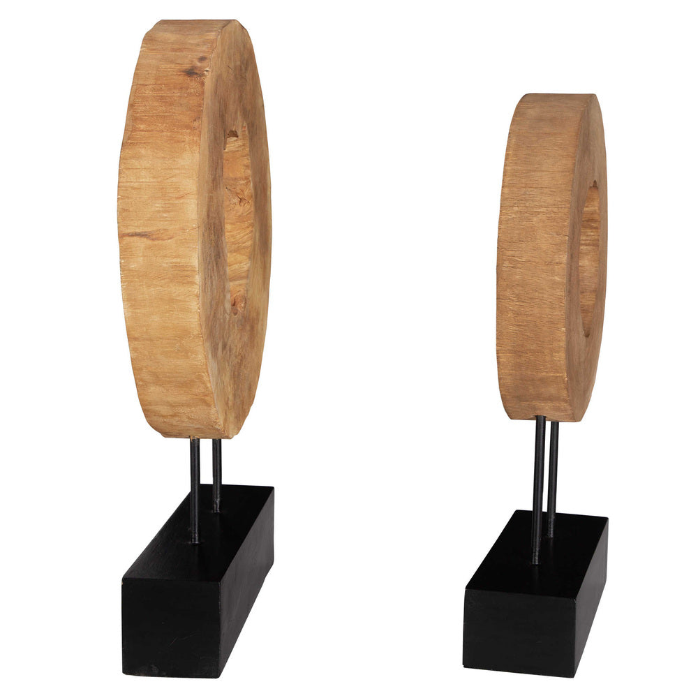 Side view of natural mango wood sculptures featuring a rustic finish and modern black bases.