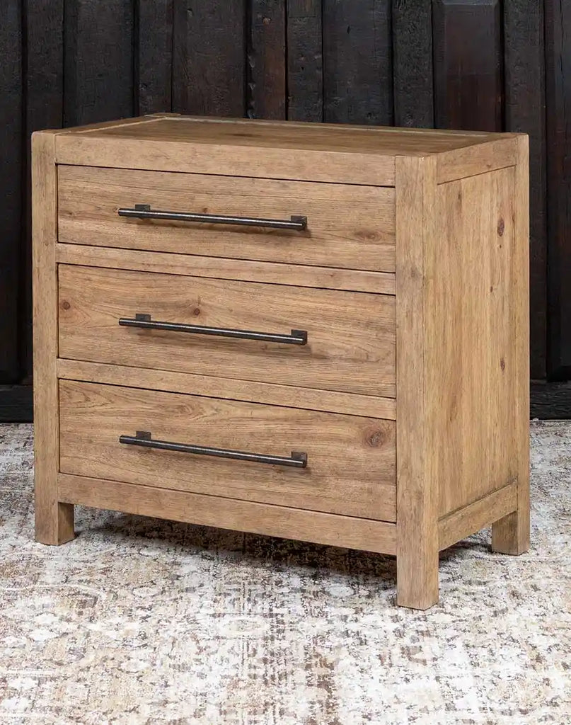 A side-angle view of the Desert Sand Triple Drawer Nightstand, highlighting the rich texture of the Pecky Hickory and White Oak veneers.