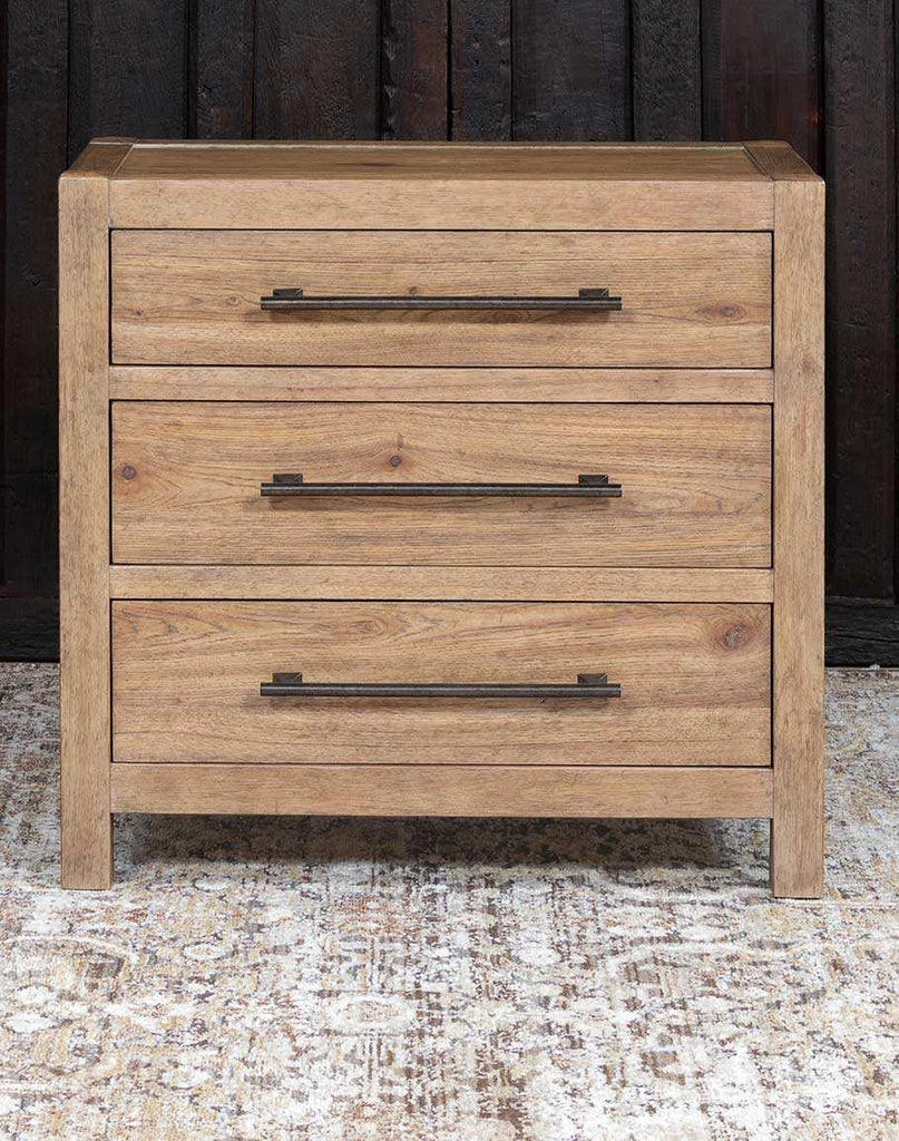 Desert Sand Triple Drawer Nightstand featuring three self-closing drawers, high-low veneer planking, and a light Sonoma finish.