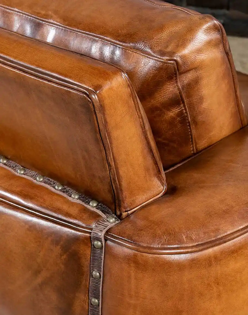 Close-up of the expertly stitched seams on the back of the Herdsman Leather Sofa, highlighting superior American craftsmanship.