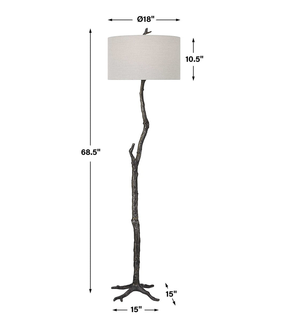 Handcrafted rustic floor lamp with a sculpted branch-style base and a sophisticated linen shade in light gray.