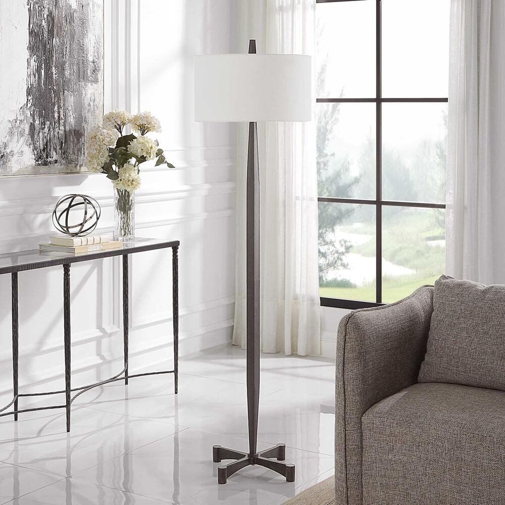 Elegant Katana Floor Lamp with traditional metalworking craftsmanship and a soft white drum shade.