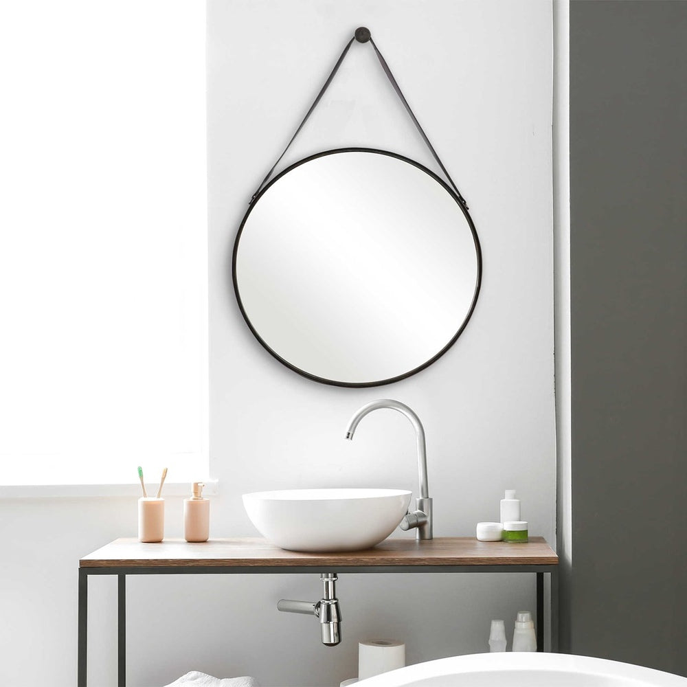 Elegant Nordic-style wall mirror with a metal frame, faux leather strap accents, and a polished antique finish.