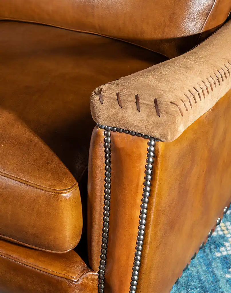 A close-up shot of the stitching details on the Norse Leather Sofa, showcasing meticulous craftsmanship.