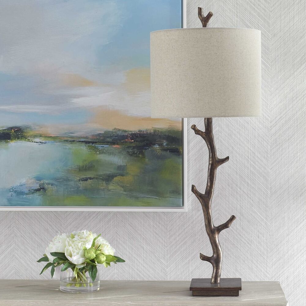 Elegant Surculus Table Lamp, featuring a tree-branch motif and a soft oatmeal linen shade.