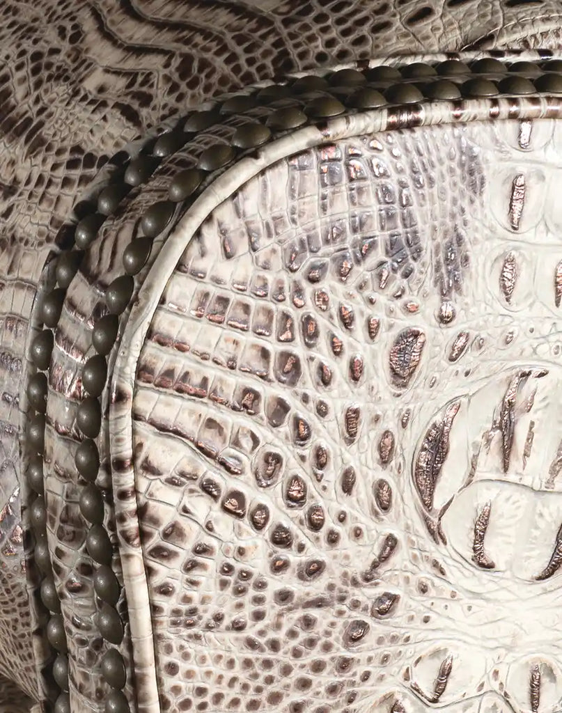 Detailed close-up of the stamped ivory croc leather used on the Elise Executive Desk Chair for a luxurious look and feel.