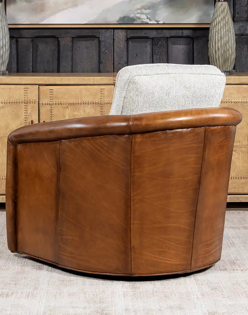 Back view of the Elsa Bark Swivel Chair displaying its clean leather finish and expert craftsmanship.