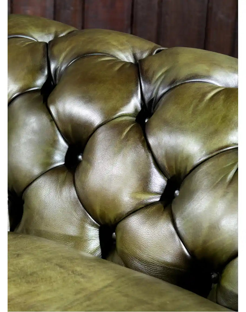 Close-up of the deep button-tufted backrest, highlighting the craftsmanship of the Evergreen Chesterfield Sofa.