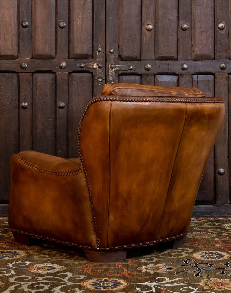 Back view of the Farmhouse Ranch Chair featuring high-quality leather craftsmanship and rustic detailing, perfect for any space.